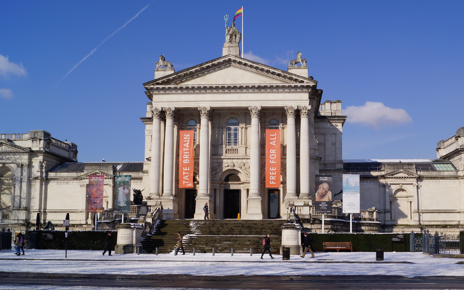 Tate Britain exterior with visitors in London, showcasing British art collection.